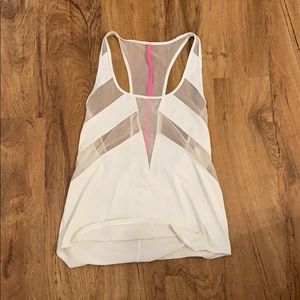 Lululemon white tank with mesh and pink. Size 6.